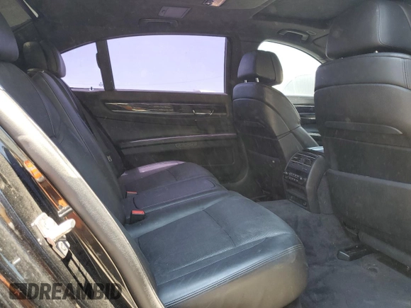 2011 BMW 7 Series с VIN WBAKX8C50BC198104, выставлен на аукционе Copart как лот 65180815 с пробегом 122 862 миль миль и Чистый • Clean title. История ставок и продаж доступна на DreamBid. Изображение 10.