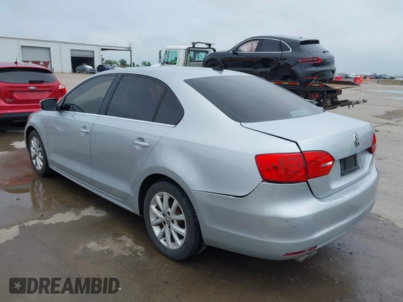 2013 Volkswagen Jetta SE with VIN 3VWDX7AJXDM373706, listed as a IAAI auction lot 42161655 with 202,471 mi miles and . Bid and sale history available at DreamBid. Image 3.