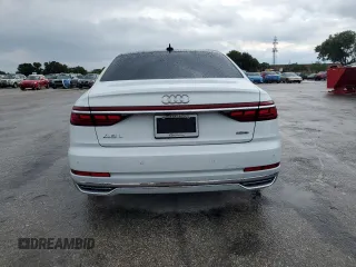 2019 Audi A8 z VIN WAU8DAF88KN004066, wystawiony jako Copart lot #56928395 z przebiegiem 93 157 mil mil oraz Czysty tytuł • Clean title. Historia ofert i sprzedaży dostępna na DreamBid. Obrazek 6.