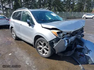2015 Subaru Forester 2.5i Touring with VIN JF2SJAWC7FH426132, listed as a IAAI auction lot 41937213 with 125,137 mi miles. Bid and sale history available at carsss.com. Image 1.