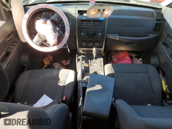 2012 Jeep Liberty Sport with VIN 1C4PJMAK8CW211242, listed as a Copart auction lot 47434565 with 112,723 mi miles and Salvage Title. Bid and sale history available at DreamBid. Image 8.