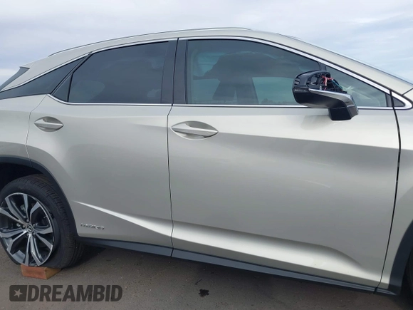 2021 Lexus RX 450h with VIN 2T2HGMDA0MC067228, listed as a IAAI auction lot 41818836 with 28,850 mi miles and . Bid and sale history available at DreamBid. Image 13.