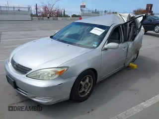2004 Toyota Camry LE with VIN 4T1BE32K24U866058, listed as a IAAI auction lot 42094444 with 279,074 mi miles. Bid and sale history available at carsss.com. Image 2.