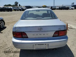 1995 Toyota Camry z VIN 4T1GK12C7SU099655, wystawiony jako Copart lot #58421895 z przebiegiem 89 299 mil mil oraz Czysty tytuł • Clean title. Historia ofert i sprzedaży dostępna na DreamBid. Obrazek 6.