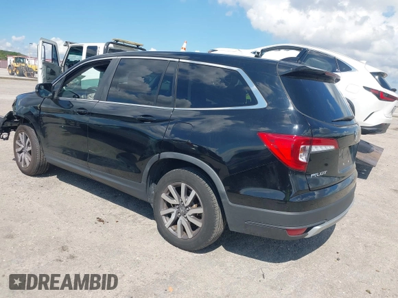 2020 Honda Pilot EX-L with VIN 5FNYF5H59LB014225, listed as a IAAI auction lot 41689776 with 90,994 mi miles. Bid and sale history available at carsss.com. Image 3.