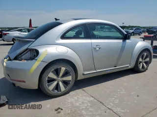 2012 Volkswagen Beetle with VIN 3VWV87AT7CM610251, listed as a Copart auction lot 52852395 with 77,550 mi miles and Salvage Title. Bid and sale history available at DreamBid. Image 3.