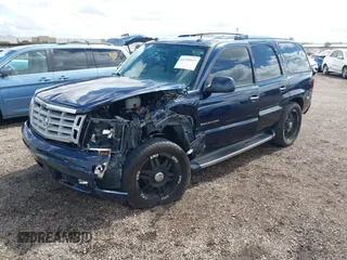 2004 Cadillac Escalade z VIN 1GYEC63T34R273497, wystawiony jako IAAI lot #41719537 z przebiegiem 256 975 mil mil oraz . Historia ofert i sprzedaży dostępna na DreamBid. Obrazek 17.