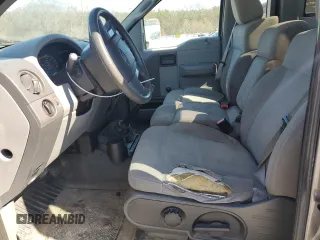 2006 Ford F-150 XL with VIN 1FTRF12286NA28327, listed as a Copart auction lot 46811965 with 139,569 mi miles and Salvage title. Bid and sale history available at DreamBid. Image 7.