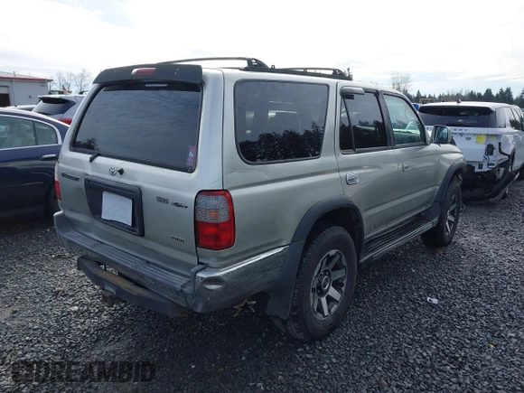 1999 Toyota 4Runner SR5 z VIN JT3HN86R0X0196528, wystawiony jako IAAI lot #41666499 z przebiegiem 294 216 mil mil oraz . Historia ofert i sprzedaży dostępna na DreamBid. Obrazek 4.