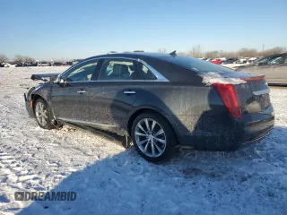 2014 Cadillac XTS with VIN 2G61L5S37E9185986, listed as a Copart auction lot 45142685 with 61,940 mi miles and Salvage Title. Bid and sale history available at carsss.com. Image 2.