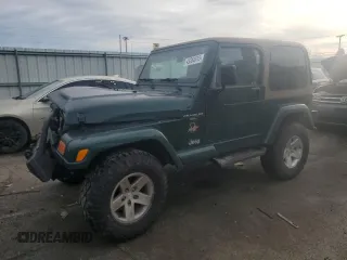 2001 Jeep Wrangler Sahara with VIN 1J4FA59S51P324010, listed as a Copart auction lot 43264515 with 163,056 mi miles and Salvage Title. Bid and sale history available at carsss.com. Image 1.
