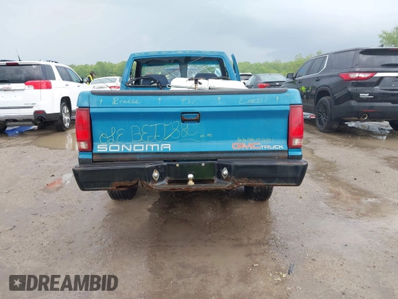 1992 GMC Sonoma z VIN 1GTCS14A9N8529102, wystawiony jako IAAI lot #42268788 z przebiegiem 83 781 mil mil oraz . Historia ofert i sprzedaży dostępna na DreamBid. Obrazek 16.