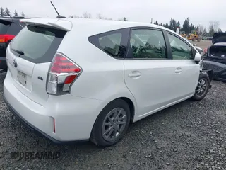 2015 Toyota Prius Two with VIN JTDZN3EU7FJ040438, listed as a IAAI auction lot 41641753 with 57,727 mi miles and . Bid and sale history available at DreamBid. Image 4.