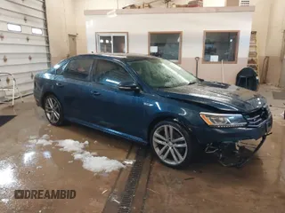 2018 Volkswagen Passat 2.0T S with VIN 1VWAA7A38JC013787, listed as a IAAI auction lot 41587362 with 127,970 mi miles. Bid and sale history available at carsss.com. Image 1.