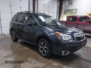 2014 Subaru Forester 2.0XT Touring with VIN JF2SJGPC7EH425711, listed as a IAAI auction lot 41549382 with 119,039 mi miles. Bid and sale history available at carsss.com. Image 1.