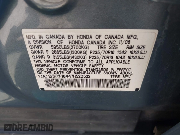 2007 Honda Pilot EX with VIN 2HKYF18447H520522, listed as a IAAI auction lot 42018937 with 128,401 mi miles. Bid and sale history available at carsss.com. Image 9.