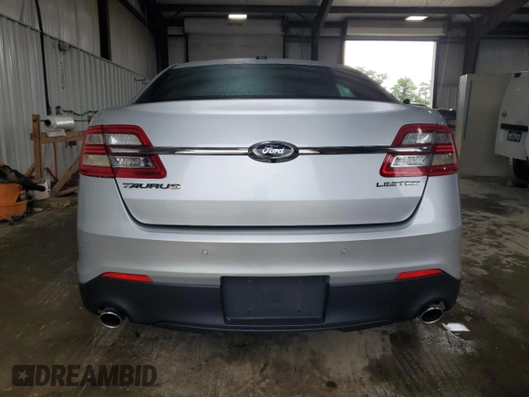 2014 Ford Taurus Limited z VIN 1FAHP2F82EG115503, wystawiony jako Copart lot #64836755 z przebiegiem 111 691 mil mil oraz Szkoda całkowita • Salvage title. Historia ofert i sprzedaży dostępna na DreamBid. Obrazek 6.