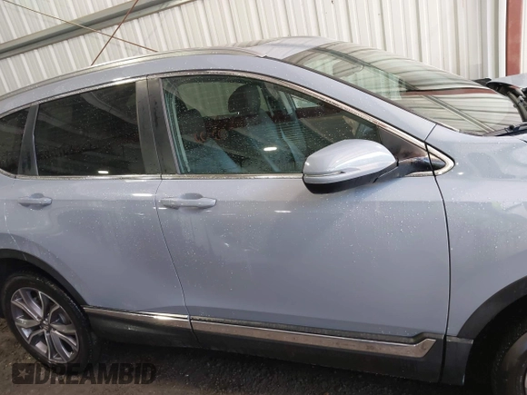 2020 Honda CR-V Touring z VIN 2HKRW2H90LH608435, wystawiony jako IAAI lot #42318256 z przebiegiem 32 602 mil mil oraz . Historia ofert i sprzedaży dostępna na DreamBid. Obrazek 13.