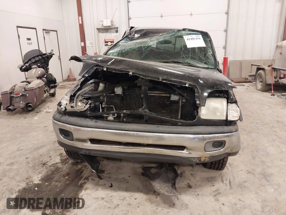 2001 Toyota Tundra SR5 with VIN 5TBRT34131S169696, listed as a IAAI auction lot 41481456 with 215,679 mi miles and . Bid and sale history available at DreamBid. Image 12.