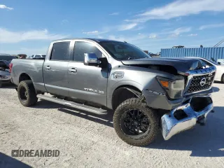 2016 Nissan Titan XD Platinum Reserve with VIN 1N6BA1F20GN516048, listed as a Copart auction lot 77580474 with 145,264 mi miles and Salvage Title. Bid and sale history available at carsss.com. Image 4.