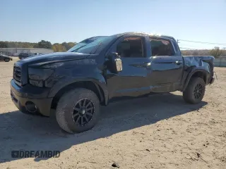 2009 Toyota Tundra Limited z VIN 5TFDW58119X088975, wystawiony jako Copart lot #77352854 z przebiegiem Nie podano mil oraz Szkoda całkowita • Salvage title. Historia ofert i sprzedaży dostępna na DreamBid. Obrazek 1.