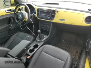 2014 Volkswagen Beetle with VIN 3VWHX7AT6EM632938, listed as a Copart auction lot 58599124 with 89,546 mi miles and Salvage Title. Bid and sale history available at DreamBid. Image 8.