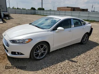 2016 Ford Fusion Titanium with VIN 3FA6P0D98GR304403, listed as a Copart auction lot 59829575 with 127,823 mi miles and Salvage title. Bid and sale history available at DreamBid. Image 1.