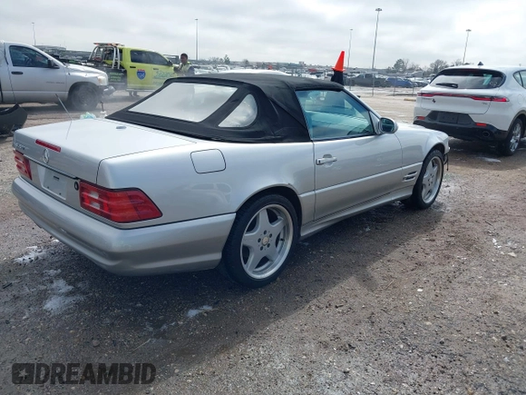 2000 Mercedes-Benz SL with VIN WDBFA68F0YF188738, listed as a IAAI auction lot 41652926 with 61,075 mi miles. Bid and sale history available at carsss.com. Image 4.