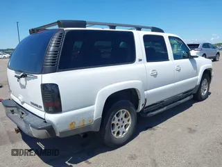 2003 Chevrolet Suburban LT z VIN 3GNFK16Z33G308805, wystawiony jako IAAI lot #42612393 z przebiegiem 205 213 mil mil oraz . Historia ofert i sprzedaży dostępna na DreamBid. Obrazek 4.