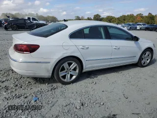2013 Volkswagen CC Sport with VIN WVWBP7ANXDE565694, listed as a Copart auction lot 77947514 with 180,160 mi miles and Salvage Title. Bid and sale history available at carsss.com. Image 3.