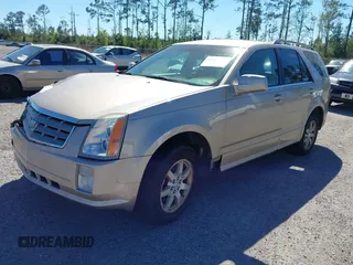 2006 Cadillac SRX z VIN 1GYEE637760197643, wystawiony jako IAAI lot #41864261 z przebiegiem 223 047 mil mil oraz . Historia ofert i sprzedaży dostępna na DreamBid. Obrazek 2.