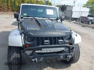 2008 Jeep Wrangler Unlimited Sahara with VIN 1J4GA59158L623784, listed as a IAAI auction lot 40365783 with 185,224 mi miles and . Bid and sale history available at DreamBid. Image 6.