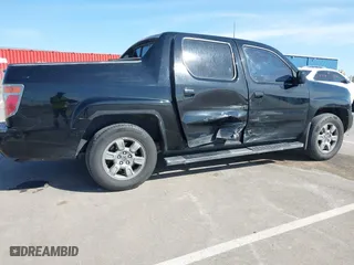 2007 Honda Ridgeline RTX with VIN 2HJYK16377H515373, listed as a IAAI auction lot 41912195 with 200,683 mi miles. Bid and sale history available at carsss.com. Image 6.