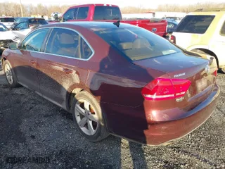 2013 Volkswagen Passat SE w/Sunroof with VIN 1VWBP7A31DC126908, listed as a IAAI auction lot 41216276 with 145,699 mi miles. Bid and sale history available at carsss.com. Image 3.