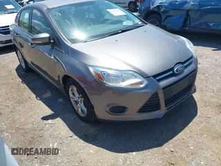 2013 Ford Focus SE z VIN 1FADP3F20DL235001, wystawiony jako IAAI lot #42343368 z przebiegiem 202 356 mil mil oraz . Historia ofert i sprzedaży dostępna na DreamBid. Obrazek 1.