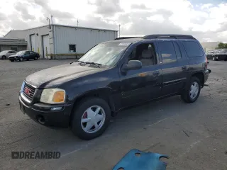2003 GMC Envoy XL SLT with VIN 1GKES16SX36220489, listed as a Copart auction lot 71859834 with 148,811 mi miles and Salvage Title. Bid and sale history available at carsss.com. Image 1.