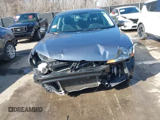 2015 Volkswagen Passat 1.8T Limited Edition with VIN 1VWAT7A33FC015366, listed as a IAAI auction lot 41769888 with 129,117 mi miles. Bid and sale history available at carsss.com. Image 6.