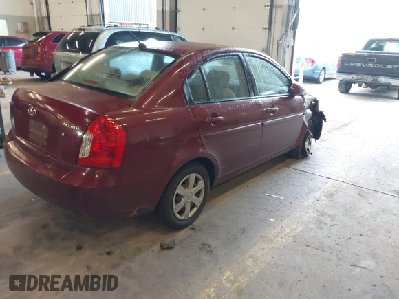 2007 Hyundai Accent GLS with VIN KMHCN46C27U111106, listed as a IAAI auction lot 41383317 with 147,882 mi miles. Bid and sale history available at carsss.com. Image 4.