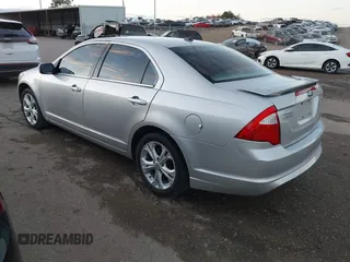 2012 Ford Fusion SE z VIN 3FAHP0HA4CR213409, wystawiony jako IAAI lot #41079155 z przebiegiem 139 129 mil mil oraz . Historia ofert i sprzedaży dostępna na DreamBid. Obrazek 3.