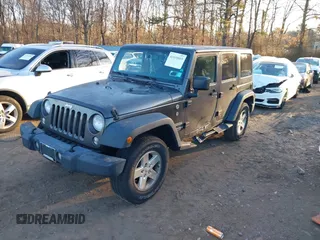 2018 Jeep Wrangler JK Unlimited Sport with VIN 1C4BJWDG2JL810424, listed as a IAAI auction lot 41610669 with 73,830 mi miles. Bid and sale history available at carsss.com. Image 17.