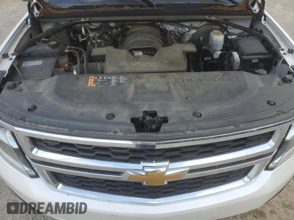 2017 Chevrolet Suburban LT z VIN 1GNSCHKC8HR330084, wystawiony jako Copart lot #52335325 z przebiegiem Nie podano mil oraz Szkoda całkowita • Salvage title. Historia ofert i sprzedaży dostępna na DreamBid. Obrazek 12.