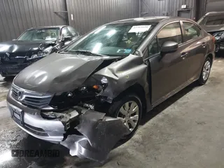 2012 Honda Civic LX z VIN 19XFB2F59CE373830, wystawiony jako IAAI lot #42312118 z przebiegiem 106 541 mil mil oraz . Historia ofert i sprzedaży dostępna na DreamBid. Obrazek 18.