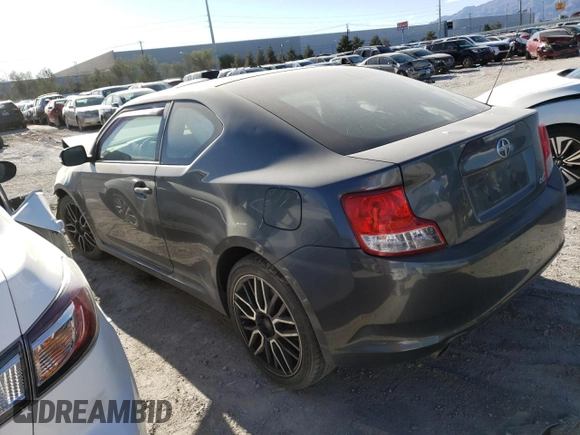 2012 Scion tC z VIN JTKJF5C71C3040608, wystawiony jako Copart lot #53704565 z przebiegiem Nie podano mil oraz Szkoda całkowita • Salvage title. Historia ofert i sprzedaży dostępna na DreamBid. Obrazek 2.