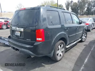 2012 Honda Pilot Touring with VIN 5FNYF3H9XCB008456, listed as a IAAI auction lot 41923004 with Not Provided miles and . Bid and sale history available at DreamBid. Image 4.