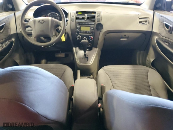 2009 Hyundai Tucson GLS with VIN KM8JM12B69U034698, listed as a Copart auction lot 49489595 with 127,413 mi miles and Salvage Title. Bid and sale history available at carsss.com. Image 8.