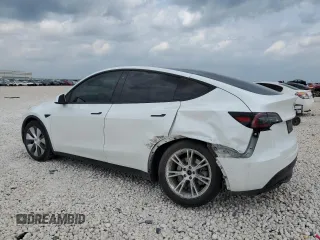 2020 Tesla Model Y Long Range z VIN 5YJYGDEE7LF010461, wystawiony jako Copart lot #55184315 z przebiegiem 88 285 mil mil oraz Szkoda całkowita • Salvage title. Historia ofert i sprzedaży dostępna na DreamBid. Obrazek 2.