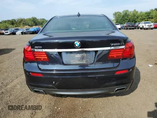 2015 BMW 7 Series 750i xDrive with VIN WBAYB6C53FD966042, listed as a Copart auction lot 69387464 with 64,977 mi miles and Salvage Title. Bid and sale history available at carsss.com. Image 6.