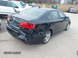2012 Volkswagen Jetta TDI w/Premium with VIN 3VWLL7AJXCM073394, listed as a IAAI auction lot 41602574 with 159,668 mi miles and . Bid and sale history available at DreamBid. Image 4.