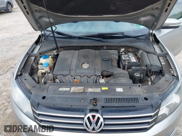 2013 Volkswagen Passat SE with VIN 1VWBP7A30DC098440, listed as a IAAI auction lot 42722686 with 305,716 mi miles and . Bid and sale history available at DreamBid. Image 10.