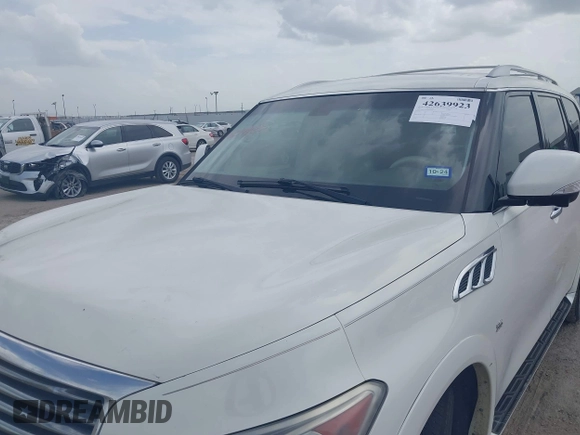 2014 Infiniti QX80 with VIN JN8AZ2NF4E9552823, listed as a IAAI auction lot 42639923 with 176,732 mi miles and . Bid and sale history available at DreamBid. Image 6.